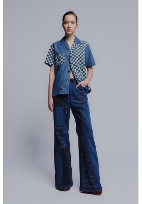 The "patch-mix" flared leg iconic recycled denim pants in blue